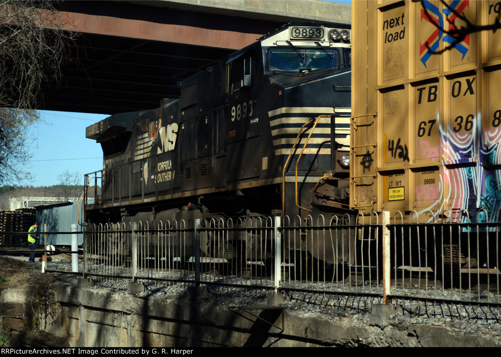 Conductor on NS yard job E19 prepares to line the switch to gain access into the interchange yard